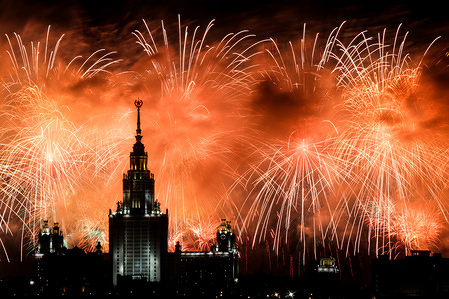 Fireworks explode behind the Moscow State University main building during celebrations of Victory Day on the 75th anniversary of the victory over Nazi Germany in WW2.