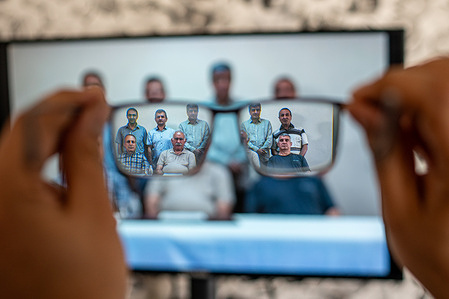 A man watches a video of PKK Leader Abdullah Öcalan (C) on his TV. Kurdistan Workers' Party (PKK) founding leader Abdullah Öcalan, in a video message from İmralı Prison, once again called on the organization to disarm.