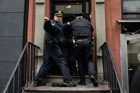 Police make an arrest during a protest to “End Islamification” organized by far-right activist Jake Lang outside of Grace Mansion in New York, New York, USA.