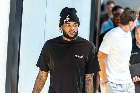 Los Angeles Lakers player Jaden Hardy leaves the InterContinental Hotel for a team dinner during the Lakers' team mini camp.