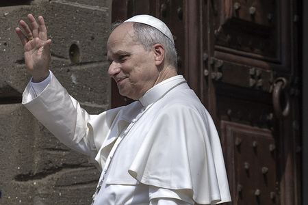 Pope Leo XIV greets the faithful at the end of the mass on the Solemnity of the Assumption of the Blessed Virgin Mary in the Pontifical Parish of St. Thomas of Villanova in Castel Gandolfo.