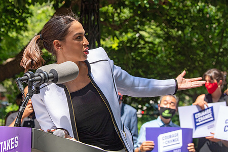 United States Congresswoman Alexandria Ocasio-Cortez speaks at a rally outside City Hall in New York City. 
Representative Alexandria Ocasio-Cortez endorses Juumane Williams for Public Advocate, Brad Lander for Comptroller as well as 60 progressive New York City Council candidates, stretching across all five boroughs, who took the Courage To Change pledge.