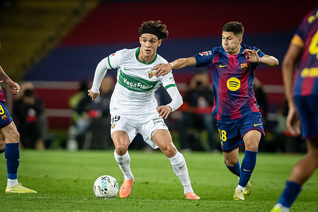 Hector Fort (Elche CF) seen in action during the La Liga EA Sports match between FC Barcelona and Elche CF at Estadi Olimpic LluÌs Companys. Final Score: FC Barcelona 3:1 Elche CF.