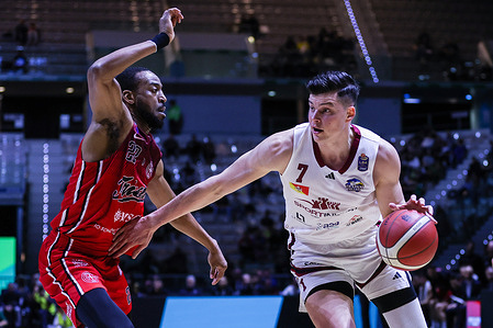 (R-L) Amar Alibegovic #7 of Trapani Shark and Markel Brown #22 of Pallacanestro Trieste during LBA Frecciarossa Final Eight 2025 quarter-finals game between Trapani Shark and Pallacanestro Trieste at Inalpi Arena. Final score Trapani Shark 72 | 74 Pallacanestro Trieste