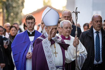 Pope Leo XIV (C) leads a penitential procession before celebrating the Ash Wednesday mass, marking the beginning of Lent at Santa Sabina Basilica.