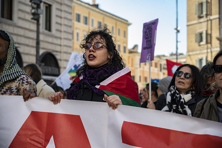 Protesters march with a banner during the demonstration. People took to the streets in Rome to protest against the "kings" of the world, that is, the presidents who want and fund wars. According to mainstream Italian media, 200k people marched. The march was supposed to end in San Giovanni square, but it continued the "tangenziale", one of the main arteries of Rome, going towards the Verno square, in front of the famous cemetery. Even if there has been some problems with protesters coming to Rome from all over the country (check points on highways, etc) the protest in the city was pacific, with little police presence, which surely played a great role in avoiding tensions.
