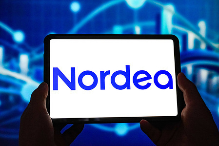 In this photo illustration, the Nordea logo is displayed on the screen of a smart tablet.