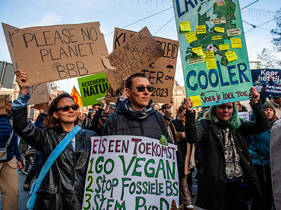 A group of protesters seen holding placards during the demonstration. Just before the Dutch general elections (Nov 22nd), around 85.000 people took the streets of Amsterdam to demand that the Dutch government take action to tackle the climate crisis. The march was organized by the Dutch Climate Crisis Coalition, which is a collaboration between eleven different organizations and groups. The demonstration counted with the presence of Swedish climate activist, Greta Thunberg.