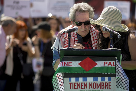 Miguel Rios, Spanish singer speaks during during a rally sponsored by "Artists for Palestine" where the names of all the children murdered in the Gaza Strip in the last two years were read.