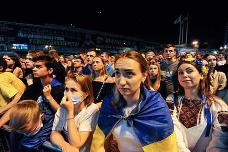 Ukrainian soccer fans react while watching a live broadcast of the quarter-finals of the UEFA EURO 2020 between the national teams of Ukraine and England.Ukraine national team lost to England 0-4.