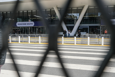 The street outside Moscone Center is closed and fenced in. The Asia-Pacific Economic Cooperation (APEC) is scheduled to hold its 2023 summit in San Francisco, California, from November 11 to November 17, primarily at the Moscone Center. The summit will bring together leaders and business representatives from various countries to engage in discussions on a range of issues. Notable figures such as President Joe Biden of the United States and President Xi Jinping of the People's Republic of China are expected to attend and meet during the summit. In preparation, streets and roads in the vicinity of the Moscone Center were closed from November 10, with access restricted to authorized vehicles only. Anticipating potential protests, the San Francisco Police Department (SFPD) has deployed hundreds of police officers to the Moscone Center and its surroundings to maintain security during the event.