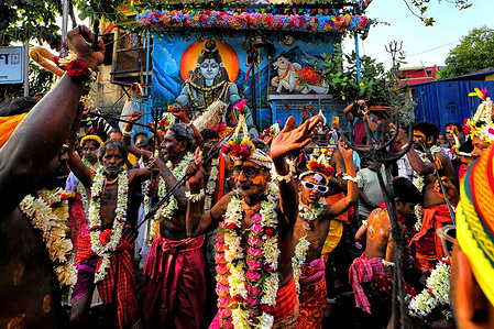 Hindu Devotees / Sannyasi's seen dancing during the Gajan Festival.