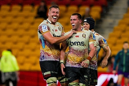 Angus Blyth congratulates Joe Brial (Queensland Reds) after his try in the Queensland Reds versus Fiji Drua match as part of the Super Rugby Pacific competition. The Reds won the game 52-7 and secure a finals spot.