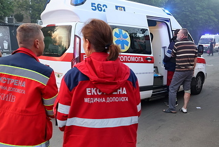 Medics assist a resident at the site of an apartment building damaged by a Russian strike in Kyiv. Kyiv has faced a series of intense Russian airstrikes in recent days, including a major missile and drone attack overnight on Tuesday, June 17, 2025. The assault killed at least 14 people and injured 44, with a residential building in the Solomianskyi district severely damaged and dozens of apartments destroyed. Among the victims was a U.S. citizen.