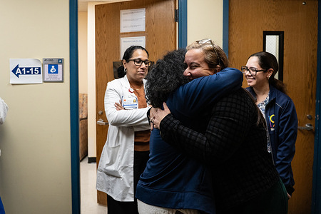 Doctors celebrate with Helen Arteaga after she was appointed Deputy Mayor of Health and Human Services by New York City Mayor-elect Zohran Mamdani in Manhattan, New York City. Arteaga served as Chief Executive Officer of NYC Health and Hospitals/Elmhurst since February 2021.