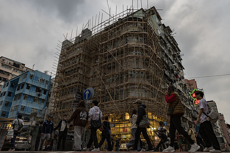 People seen walking past a building covered in bamboo scaffolding in Sham Shui Po. San Tin is being developed into the San Tin Technopole as a key innovation and technology hub within Hong Kong's Northern Metropolis. Running across five full calendar years starting with 2026 as the first year through 2030, the strategic consultation framework for the HKSAR's First Five-Year Plan outlines targeted proposals to accelerate housing, infrastructure, and regional economic growth.
