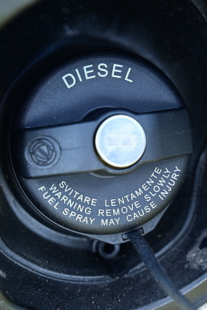 A view of a diesel fuel tank cap for a car.