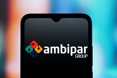 In this photo illustration, the Ambipar logo is seen displayed on a smartphone screen.