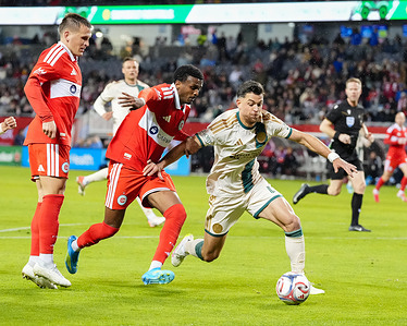 Chicago Fire Midfielder Maren Haile-Selassie (7) and Atlanta United FC Defender Enea Mihaj (4) in action during the Chicago Fire vs Atlanta United FC match at Soldier Field. Final Score: Chicago Fire 1:0 Atlanta United FC