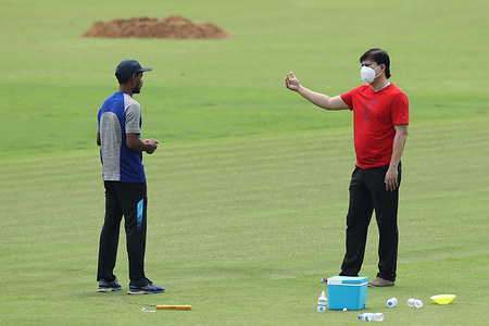 Bangladesh Cricket Board (BCB) chief selector, Minhajul Abedin talks to national player, Aminul Islam Biplob during the practice session at Sher e Bangla National cricket stadium.
The Bangladesh Cricket Board is gearing up towards a proper resumption of cricket following the relaxation of covid 19 restrictions.