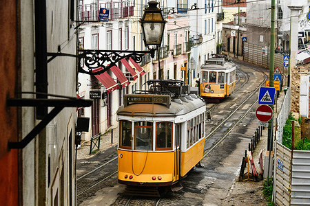 Two trolley cars run through the streets of the Graça district. According to a report from the General Health Department (DSG), Portugal has currently the lowest infection rate compared with other countries in Europe, however the lockdown is still in place to try to keep low infections.