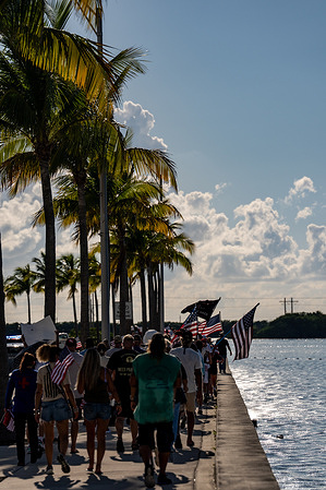 Protesters march to honor Charlie Kirk at a memorial event organized by the Monroe County Republican Party. Charlie Kirk, co-founder of Turning Point USA, was shot and killed while speaking at an event at Utah Valley University on September 10, 2025.