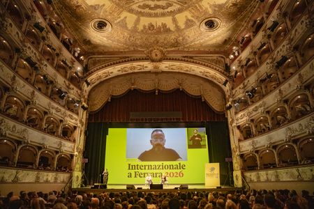 Nasser Abu Srour appears via video link at the twentieth edition of the Internazionale magazine festival. The Italian current affairs publication Internazionale celebrated the 20th anniversary of its signature journalism festival across Ferrara's historic center. Bringing together thinkers, reporters, and photographers from around the world, the three-day gathering addressed pressing global issues through public forums, live audio broadcasts, and visual storytelling exhibitions.