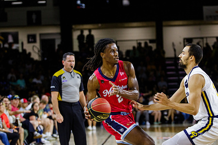 Montreal's Kevin Osawe (2) and Edmonton's Isiah Osborne seen in action during the Basketball game between Edmonton Stingers and Montreal Alliance in the 2025 CEBL action at Edmonton Expo Centre. Final score; Edmonton Stingers 94 - 83 Montreal Alliance