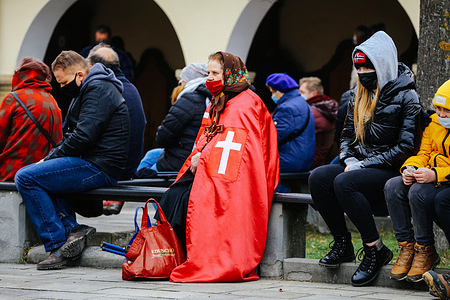 An elderly woman, wearing a cloak of a member of the movement for the enthronement of Christ as King of Poland is seen during the ceremony.
In the Kalwaria Zebrzydowska Monastery, listed on UNESCO World Heritage, every year thousands of people take part in a procession re-acting Crucifixion of Christ. However, this spring due to a record high incidence of coronavirus the formula of the celebration has been changed and people were instructed to do individual march and prayer. Formally, the third lockdown has recently started, but restrictions are widely ignored.
