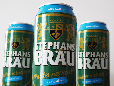 In this photo illustration, Cans of Stephans Bräu Radler Naturtrüb alcohol-free beer seen arranged on a white ground.