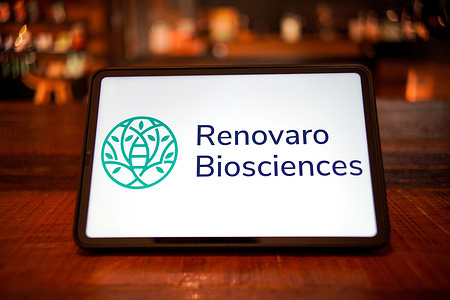 In this photo illustration, the logo of Renovaro Biosciences is displayed on the screen of the smart tablet.