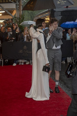 New York, United States - 05/05/2025 16:41:52: Zoe Saldaña wearing Thom Brown departs the Pierre Hotel for 2025 Met Gala in New York City.