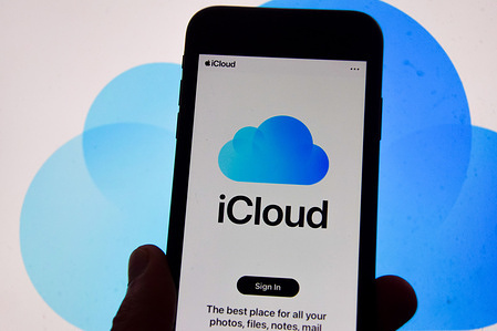 In this photo illustration, the iCloud logo seen displayed on an iPhone. Apple has been sued by consumer rights group Which? over iCloud, claiming that it is "trapping" customers into using the storage service. The lawsuit could result in 40 million UK customers receiving a payout.