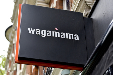 Wagamama restaurant sign in Leicester Square, London.