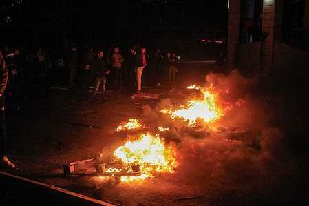 Palestinian demonstrators burn tires and block the road leading to Joseph's Tomb in the city of Nablus in the occupied West Bank. Joseph's Tomb has long been at the center of conflict between Jews, Christians, and Muslims. Some Jews believe that the biblical character Joseph is buried in the grave. Muslims believe that Sheikh Yusef al-Dwai, an 18th century Arab leader, is buried there. Joseph's tomb is located in Balata village in the suburb of Nablus on the northern West Bank