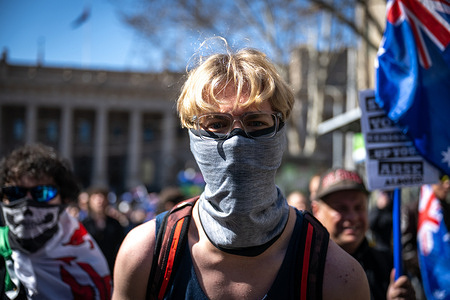 A far-right protester yelling at an anti-immigration/free speech protest in Melbourne. Hundreds of demonstrators marched through Melbourne's Central Business District, with organisers calling for stricter immigration controls and greater protections for freedom of speech and political expression, while counter-protesters gathered separately to oppose the demonstration and its political messages.