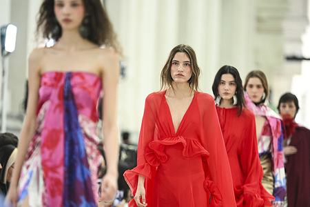 A model walks the runway wearing a design by Juan Vidal during Mercedes-Benz Fashion Week de Madrid in IFEMA.