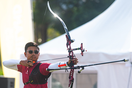 Riau Ega Agata Salsabilla of Indonesia seen in action during the Archery Men's Recurve finals in 33rd SEA Games at Football Field 1 SAT in Bangkok.