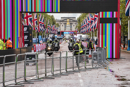 TV crews are seen on bikes at the finish line of the 40th London Marathon.
Only Elite runners will run the course this year with everyone else taking part in a ‘virtual’ marathon. The race will take place on a closed Bio-secure loop circuit around St James’s Park in central London in The Mall, Birdcage Walk & Horse Guards parade.
