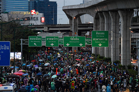 Thousands of protesters march along the Ladprao Junction during the demonstration.
Anti-government protesters attend a large demonstration demanding the resignation of Thailand Prime Minister and the reform of the monarchy following a 'State Of Emergency' declared by Prime Minister Prayut Chan-o-cha.