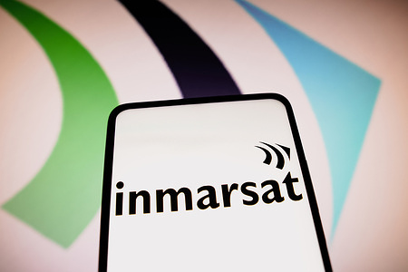 In this photo illustration, the Inmarsat logo is displayed on a smartphone screen.