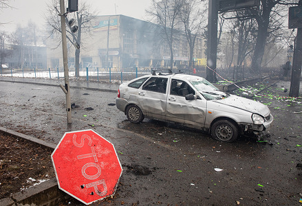 A destroyed car in the middle on the road of Kyiv following a Russian shelling attack on the city as Russian forces launch full-scale invasion of Ukraine since February 24th.
