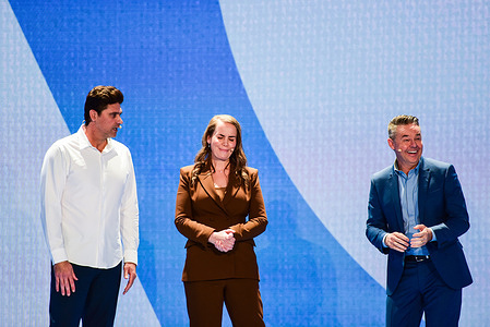Mark Philippoussis (L), Elena Dokic (C) and Todd Woodbridge (R) are seen on stage at the Australian Open 2026 Launch event.