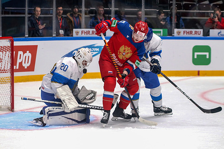 Russia U20 Hockey team player, Ivan Yanchenko (17) and Kazakhstan U20 Hockey team player, Vladimir Istomin (20) seen in action during the Liga Stavok Cup of the Future between Russia U20 and Kazakhstan U20 at SC Jubilee. Final score; Russia U20 12:1 Kazakhstan U20.