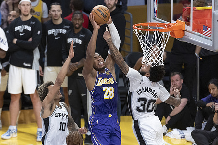 Los Angeles Lakers’ Rui Hachimura (28) goes to the basket against San Antonio Spurs’ Julian Champagnie (30) during an NBA basketball game between Los Angeles Lakers and San Antonio Spurs at Crypto.com Arena. Final Score : Lakers 118:116 Spurs