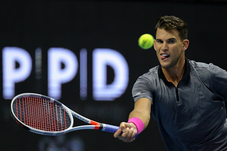 Dominic Thiem of Austria returns the ball to Roberto Bautista of Spain during the St. Petersburg Open ATP tennis tournament semi final match in St.Petersburg.