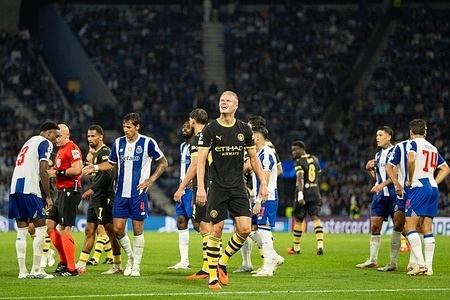 Manchester City’s player Erling Haaland smiles after receiving a yellow card during the UEFA Champions League match between FC Porto and Manchester City at Estádio do Dragão. Final scores; FC Porto 0-2 Manchester City.