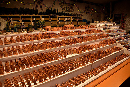 Santons from Provence are displayed on a stand during the Santon fair in Marseille. The 221st edition of the Santon Fair is bringing 23 ancient santon-making families from the four corners of Provence. This initiative enables enthusiasts to access a wide array of santons, ranging from the rarest to the most unique, along with traditional Christmas nativity scenes crafted from cardboard, cork, or bonded paper. This fair is held at the Quai du Port from November 18 to December 31, 2023.