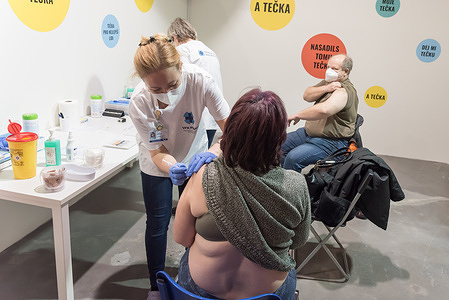 A woman receives the third injection with a dose of Comirnaty Covid-19 vaccine.
New vaccination center opens in Prague in order to speed up covid-19 vaccination in the Czech Republic.