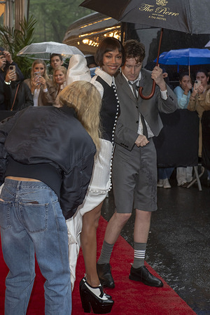 New York, United States - 05/05/2025 16:42:00: Zoe Saldaña wearing Thom Brown departs the Pierre Hotel for 2025 Met Gala in New York City.